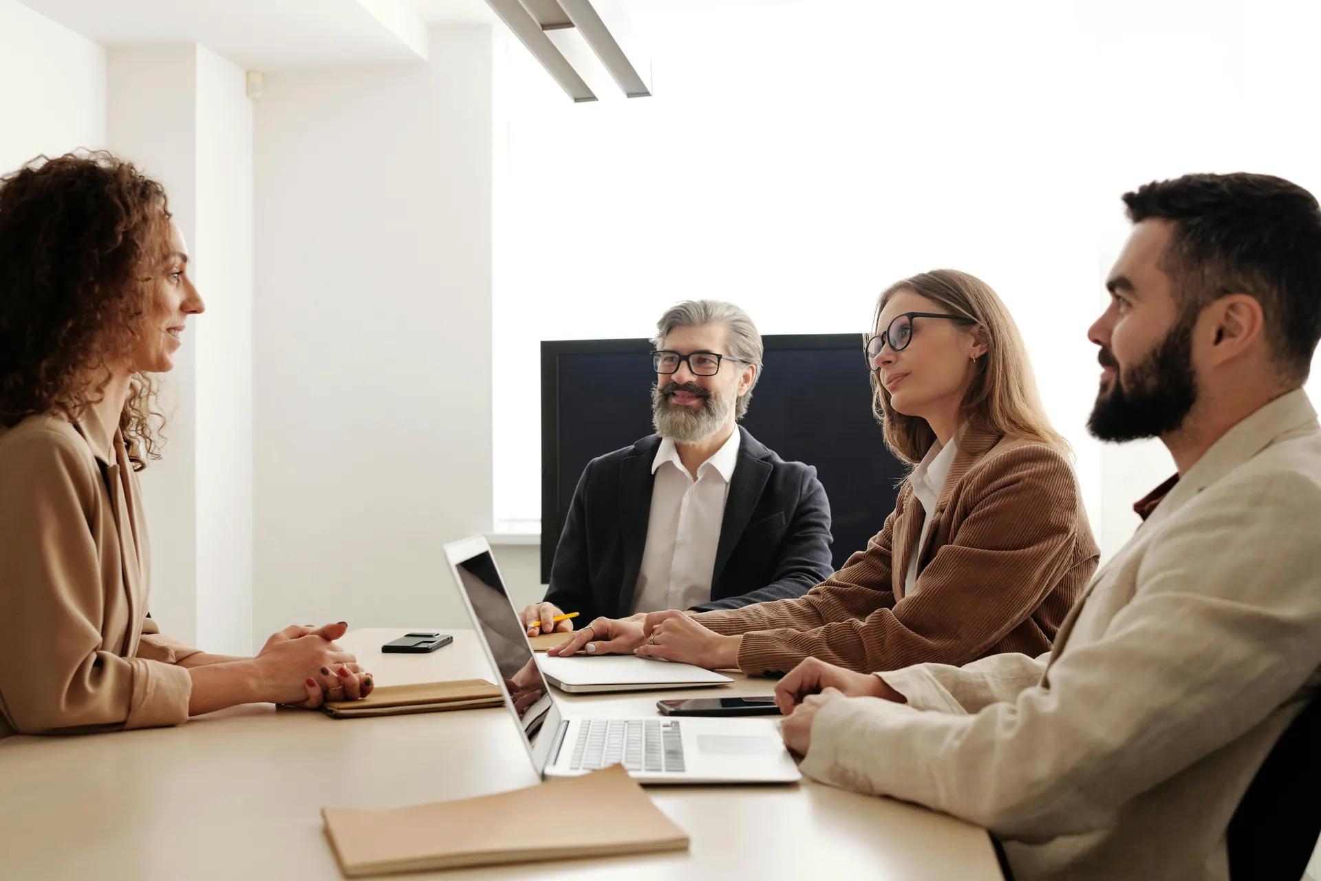 Leadership team in a meeting — strategic collaboration and excellence