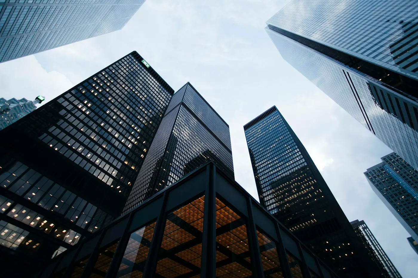 Looking up at a cluster of modern office towers