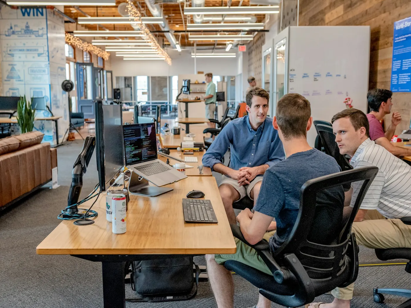 A team working at computers in an open-plan office