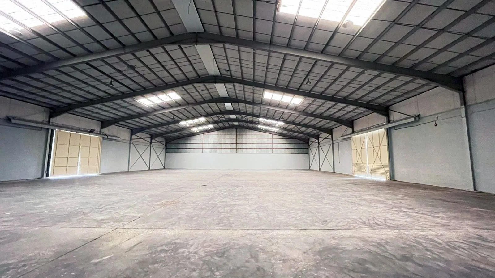 High-clearance warehouse interior in Sitra