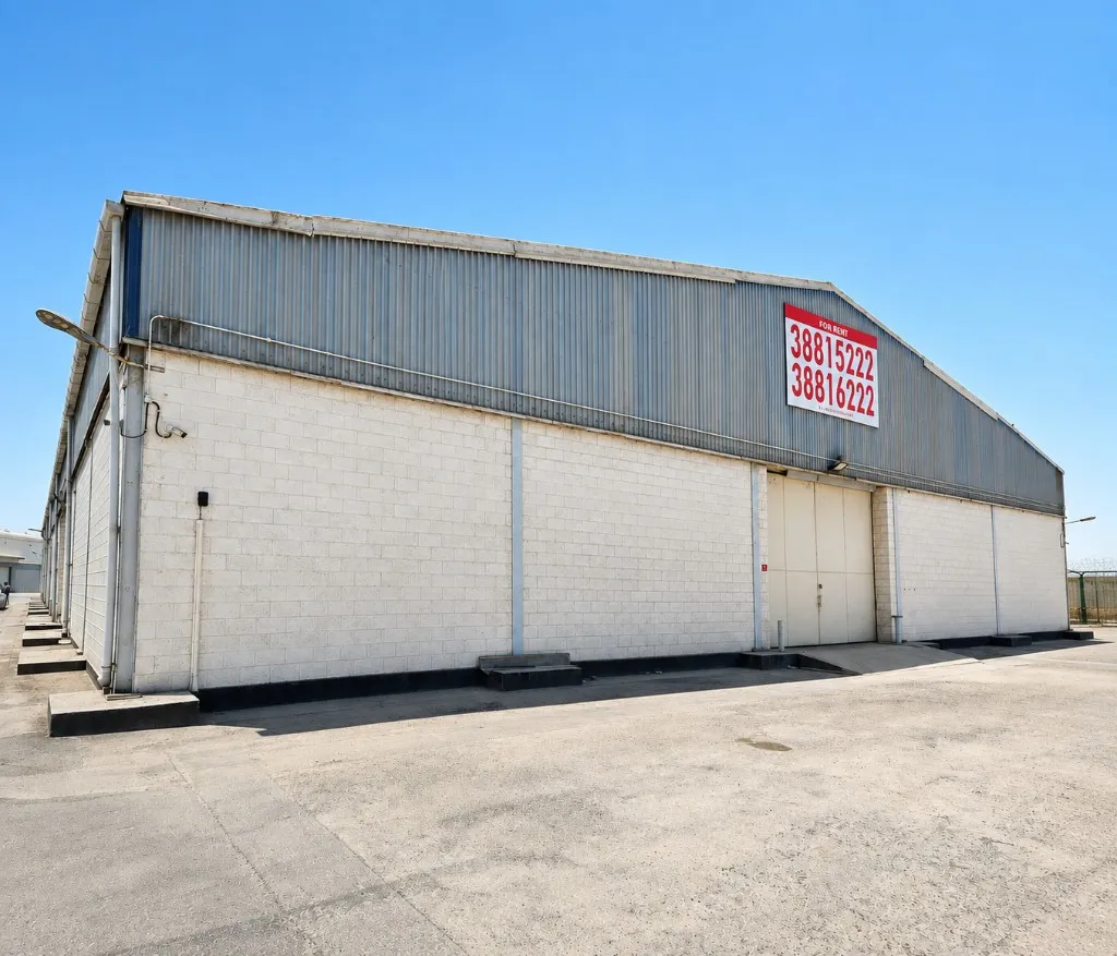 Sitra warehouse unit with a For Rent sign for short-term or overflow space